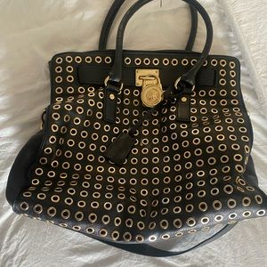 Michael Kors black and gold studded satchel bag